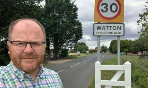 George Freeman MP by the Watton sign