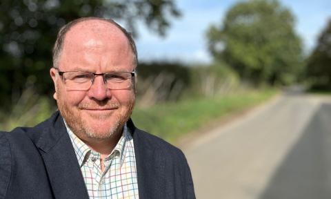 George Freeman MP standing in a country lane