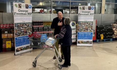 George Freeman MP speaks to a constituent at his Dereham Supermarket Surgery