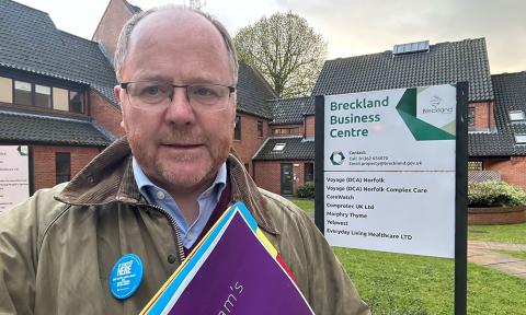George Freeman MP by Breckland Business Centre sign